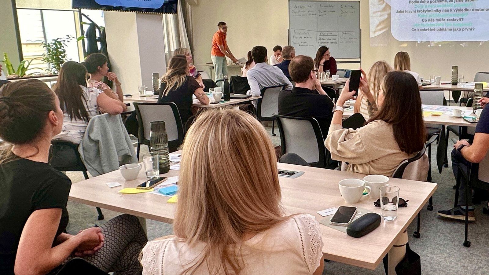 Participants collaborating at a team workshop