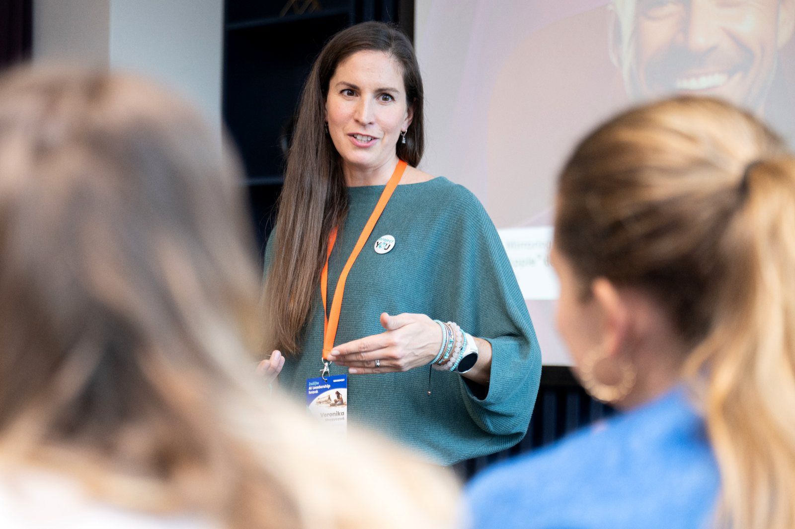 A projectYOU facilitator talking with workshop participants